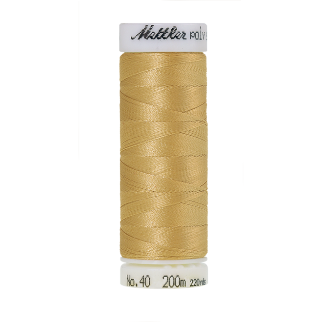 Amann Mettler Poly Sheen Champagne glänzt durch den trilobalen Fadenquerschnitt besonders schön. Zum Sticken, Quilten, Nähen. 200m Spule